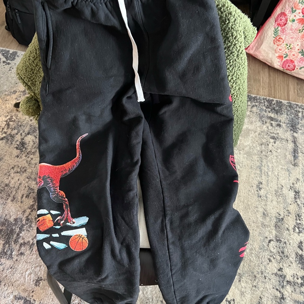 OVO DRAKE X RAPTORS Black Joggers with Dinosaur Print